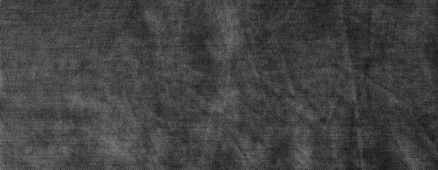 Stitched dark black and white denim cotton jeans fabric texture background