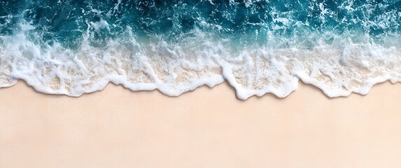 Ocean waves gently lap the sandy shore on a clear day