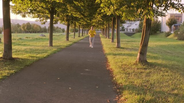 Active senior man jogging in nature, suddenly experiencing chest pain, highlighting heart health awareness during exercise, heart health and exercise safety