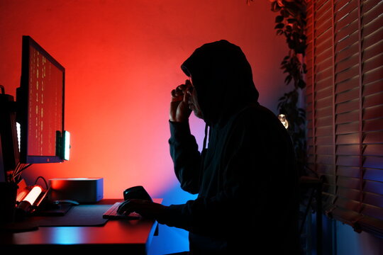 male hand typing on a laptop with programming code on the screen, representing software development. Perfect for coding, IT solutions, digital technology,
