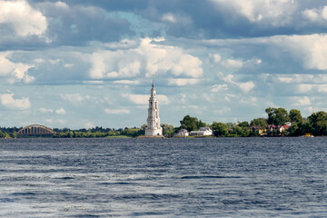 The flooded bell tower of St. Nicholas Cathedral rises above the surface of the Volga River. Kalyazin, Tver region.