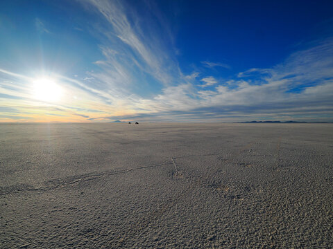 Photography of Salar de Uyuni during dry season, picture taken against the sun low over the horizon