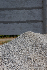 A pile of crushed stone, gravel for construction work, used for building foundations, road works and repairs. Construction and architectural industry	
