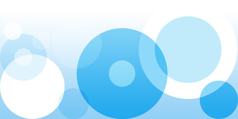 Modern background arrangement overlapping circles. Soft blue-to-white gradient backdrop. Various sized circles in different shades blue and white scattered across frame and their translucent nature