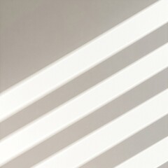 Obraz premium A beautifully crafted ceramic vase filled with vibrant, blooming flowers, including roses and daisies, rests elegantly on a polished wooden floor.