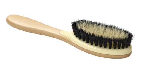 Oval-shaped brush with light beige handle and black bristles
