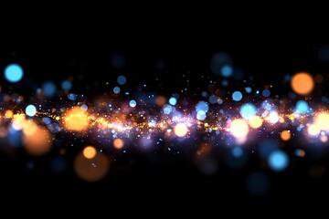 Glowing particles with blue and orange bokeh lights floating on black background create magical atmosphere for festive designs and holiday backgrounds.