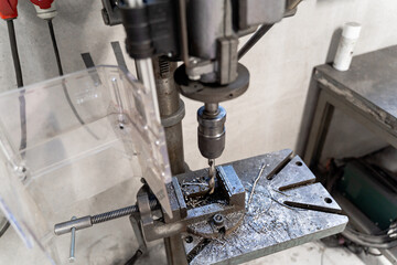 Precision Drilling Machine Used in a Typical Workshop Setting for Various Tasks and Projects
