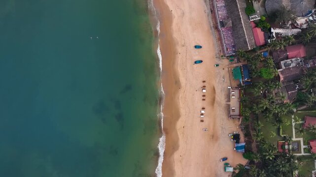 drone shot of sinquerim beach in goa