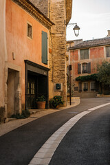 Cozy street of old Provençal town in soft sunset light, romantic Mediterranean atmosphere.	
