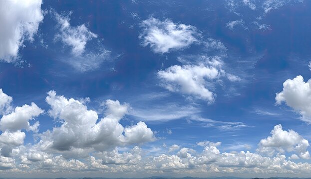 Vast blue sky filled with fluffy white clouds - Powered by Adobe