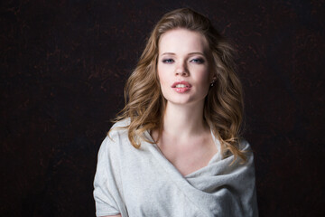 Beauty fashion portrait of attractive beautiful woman with long flying hair.