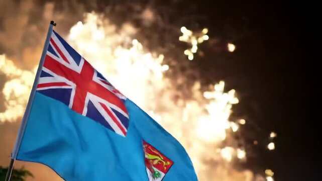 Fiji Flag Waving Against Fireworks Display Celebration.