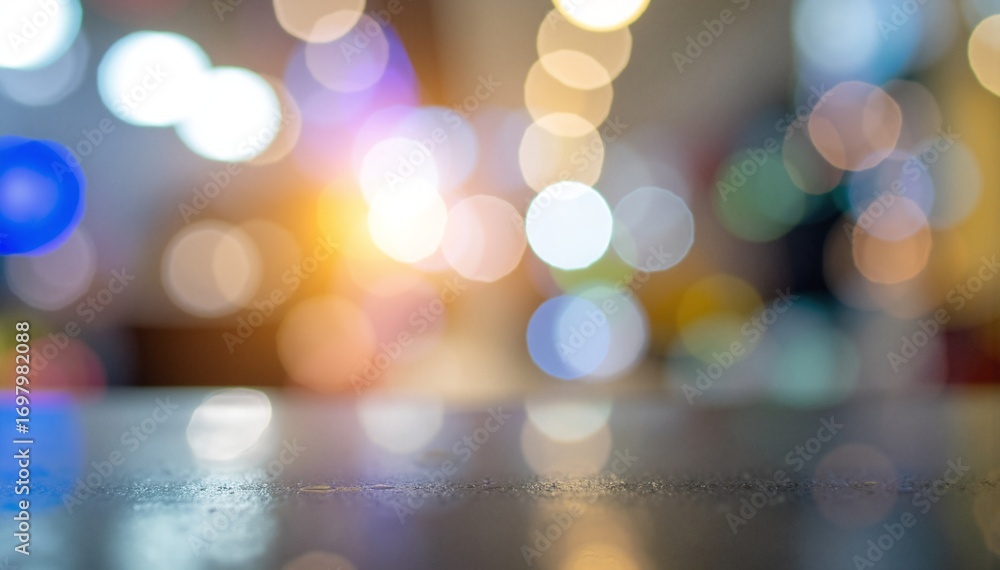 Poster a close-up view of decorative lights arranged on a wooden table, casting a warm glow and creating a 