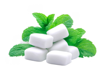 Several white square shaped candies are stacked together with mint leaves on transparent background