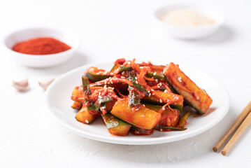 Korean kimchi cucumber on white background, Korean side dish, Homemade food