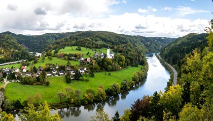 Naklejka premium Panoramic view of a river valley with autumn colors