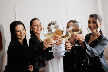 Friends celebrating together with drinks during a joyful gathering in a cozy setting