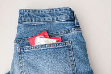 Two condoms in jeans pocket