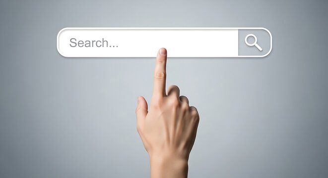 Hand pointing at a search bar on a gray background.