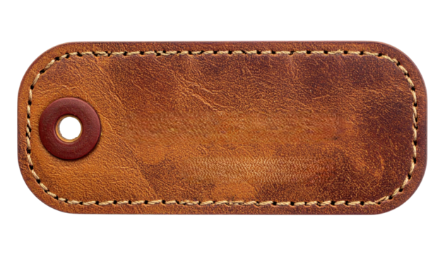 A vintage leather tag featuring a circular hole and stitched edges, showcasing its rich texture and warm brown color.