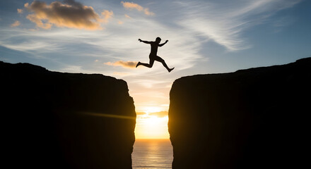 Man jumping over a chasm at sunset achieving goals success challenge leap of faith risk taking brave courageous determined motivation inspiration