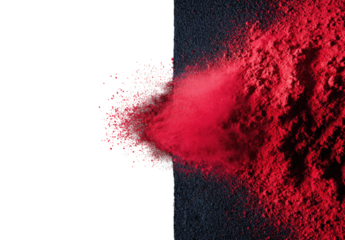 Red powder explosion on black background
