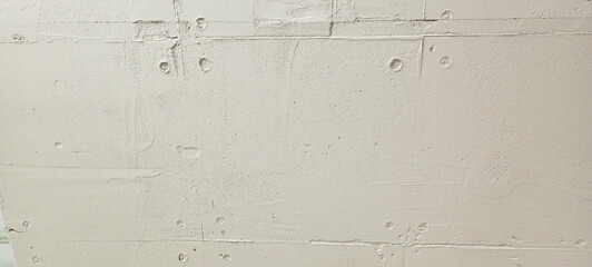 plaster texture looking background on concrete wall