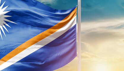Marshall Islands national flag waving in an amazing sunlight. National flag waving on mast.