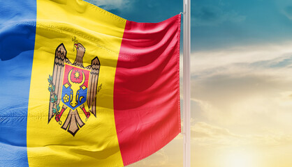 Moldova national flag waving in an amazing sunlight. National flag waving on mast.