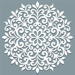 A beautiful white ornamental mandala design with intricate floral patterns and swirling filigree on a muted gray background.