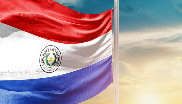Paraguay national flag waving in an amazing sunlight. National flag waving on mast.