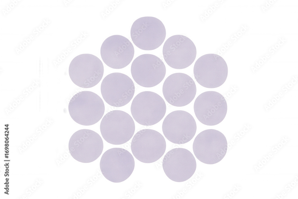 Poster round paper stickers arranged in a triangular shape, creating a customizable design element on a tra