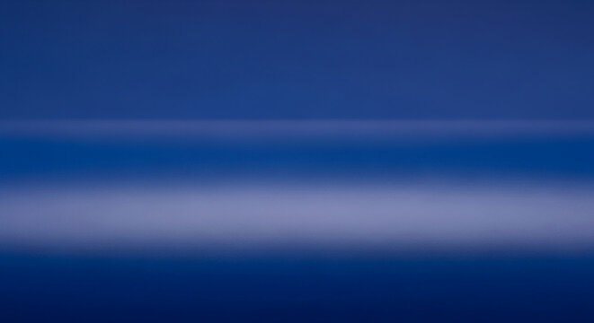 Smooth gradient of dark and light blue shades, creating a calm and serene atmosphere, ideal for background or presentation purposes, showcasing simplicity and elegance