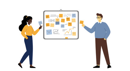 Two people in front of a whiteboard covered with sticky notes and drawings