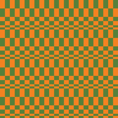 A seamless plaid checker pattern with olive green and orange blocks. Retro aesthetic background for textile design, gift wrap, scrapbooking, and modern home décor. 