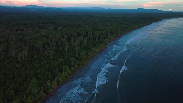 Cape Wom Meri beach Dogreto Bay Madang Wewak Harbor View Papua New Guinea aerial drone Kavieng Vanimo Tufi coastline early morning sunrise untouched morning remote tropical shore waves forward pan up