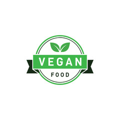 a green vegan food logo with leaves and banner design on transparent background