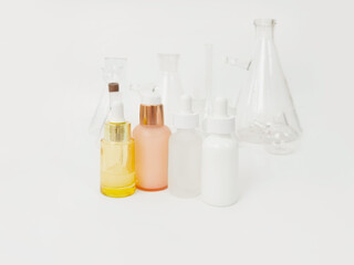 skin serum, moisturizing and whitening serum, fruit acids.Glass Volumetric Flask  ,Laboratory Flasksare used for  laboratory work  in the background