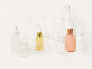 skin serum, moisturizing and whitening serum, fruit acids.Glass Volumetric Flask  ,Laboratory Flasksare used for  laboratory work  in the background