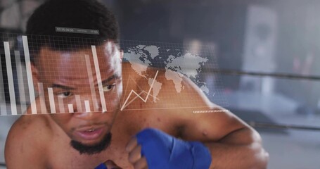 Standing shirtless boxer wearing blue wraps facing data hologram against gym ring ropes, copy space