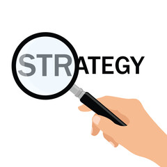 Hand holding magnifying glass, strategy word zoomed. Business concept, focus on strategy, search or planning idea
