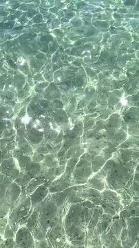 Top view of sea little waves pattern and crystal clear water. Armenia, Sevan. High quality