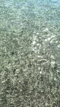 Top view of sea little waves pattern and crystal clear water. Armenia, Sevan. High quality