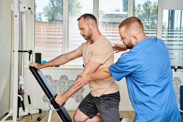 Rehabilitation session between a patient and physiatrist in a modern center