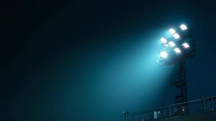 照明塔が霧の夜空へ光を放つ競技場外観の情景図