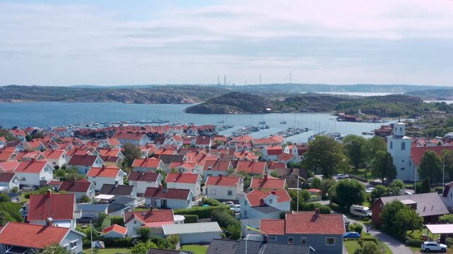 Bohus-malm&ouml;n village by the ocean on Swedish West coast from above. Rocky island in Soten&auml;s municipality. harbour and chruch