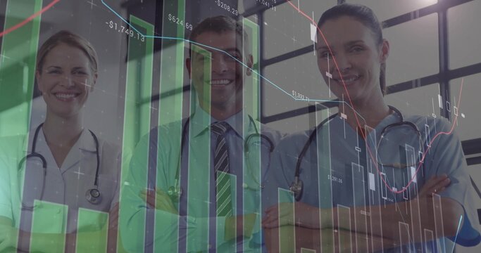 Crossing arms, medical team wearing stethoscopes and scrubs displaying financial charts in corridor - Powered by Adobe