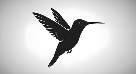Fototapeta premium Elegant hummingbird silhouette in flight, perfect for nature lovers and designs with a touch of grace