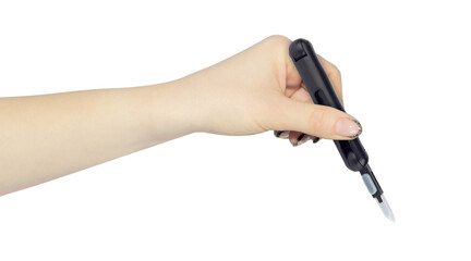 multitool for cleaning headphones in hand, outstretched hand with multitool for cleaning headphones isolated on background